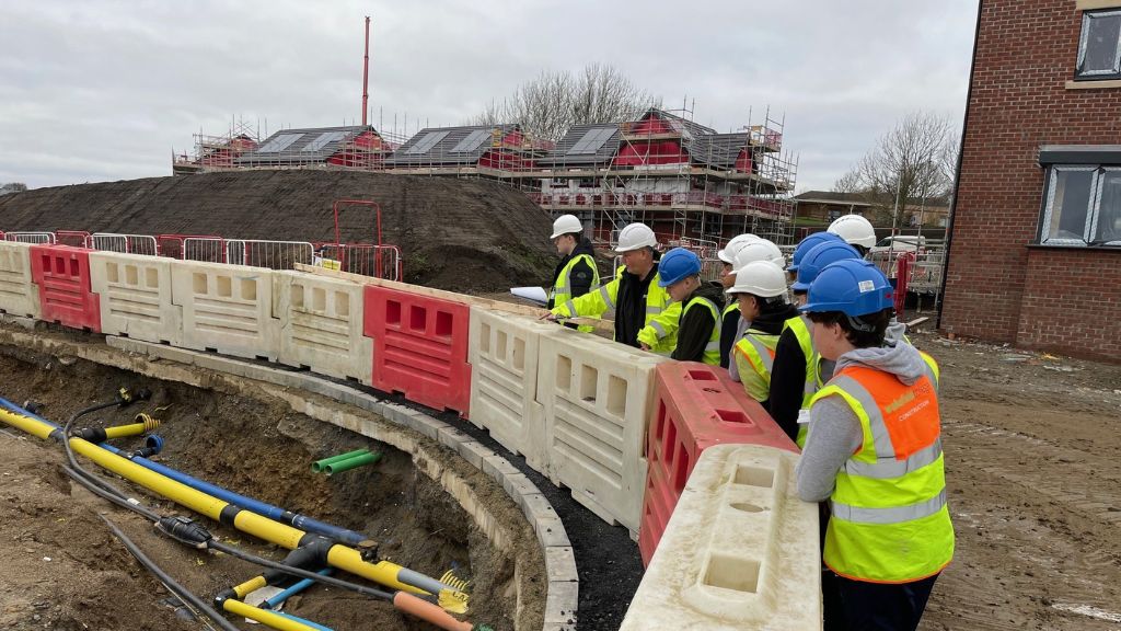 Construction Technical students at construction site 