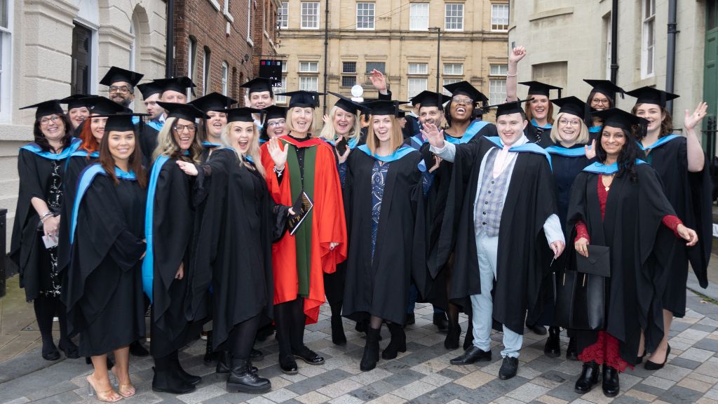 Graduates in cap and gowns