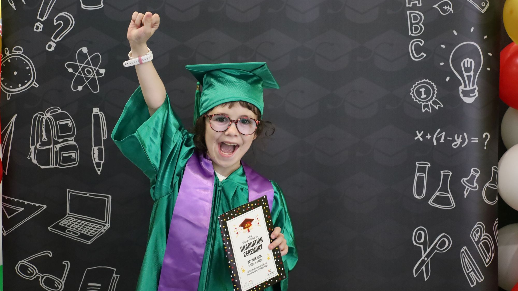 Agnes celebrating her graduation