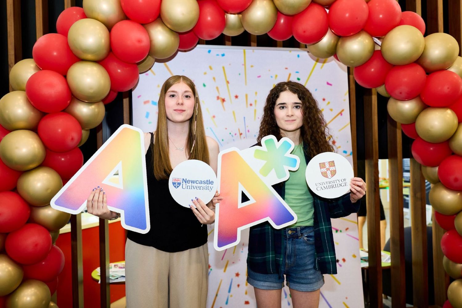 Twins Molly Broadhead (left) and Nancie Broadhead (right) celebrating their results