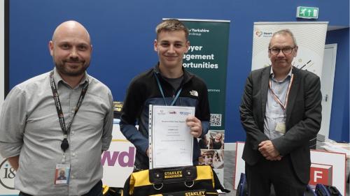 Student with his award