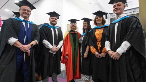 Graduates with caps and gowns 