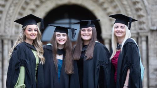 Graduates in cap and gowns 