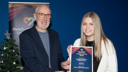 Andrew McConnell OBE presenting a student award 