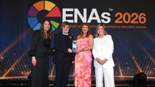 College tutor and student accepting ENA Award