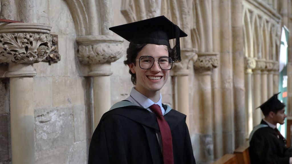 Student with cap and gown