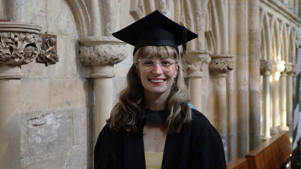 Student with cap and gown