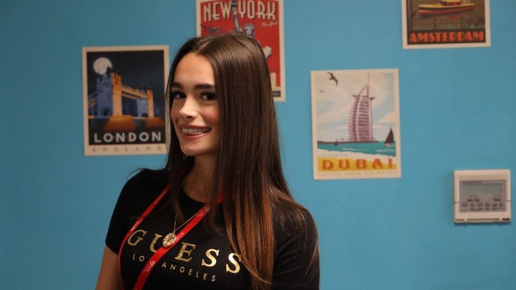 Student smiling in classroom