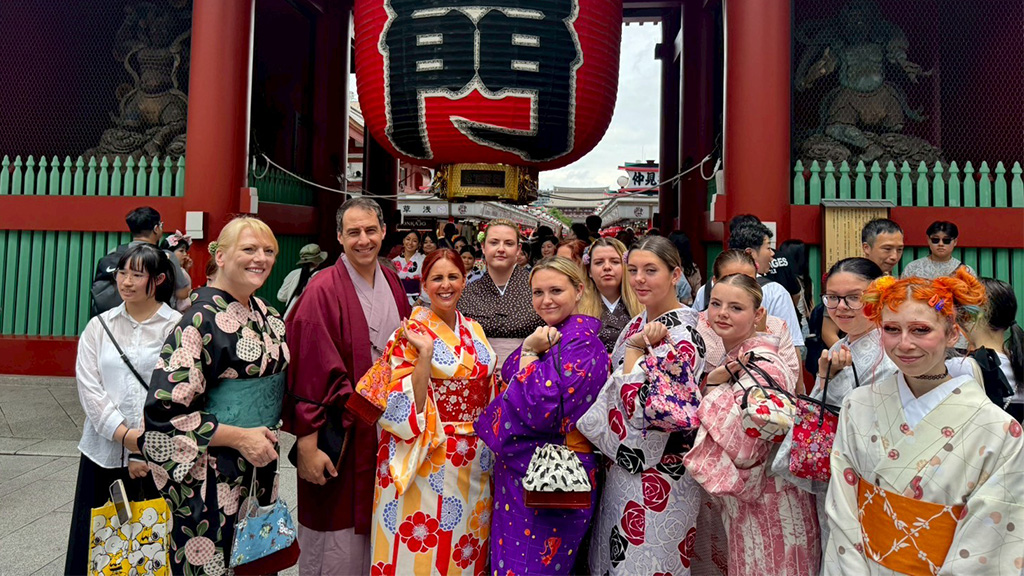 Students wearing kimonos at shrine in Japan