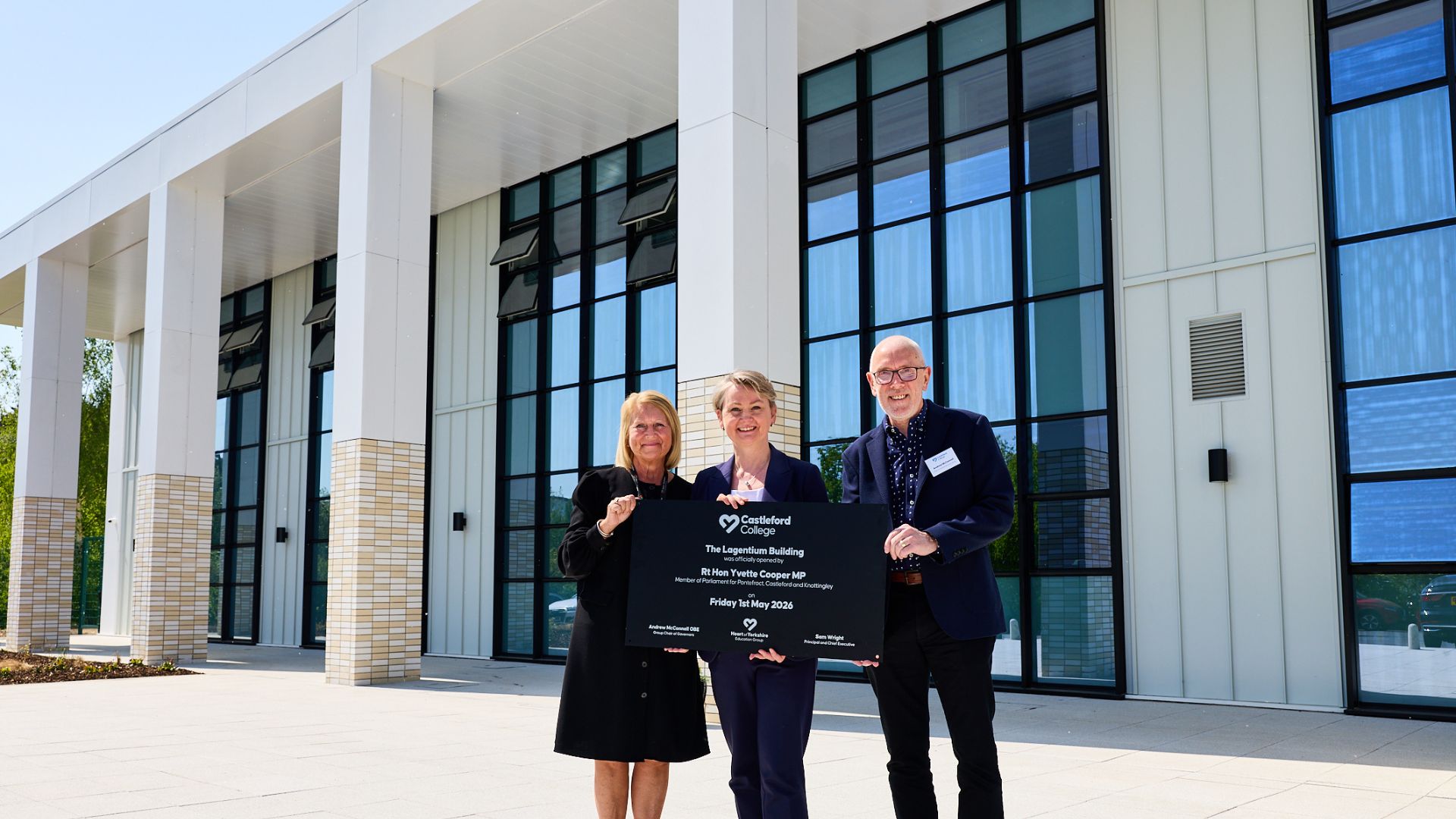 Sam Wright, Principal and Chief Executive of the Heart of Yorkshire Education Group (left) with Rt Yvette Cooper, Secretary of State for Foreign, Commonwealth and Development Affairs and MP for Pontefract, Castleford and Knottingley and Chair of Governors at the Group, Andrew McConnell (right) outside the Lagentium Building
